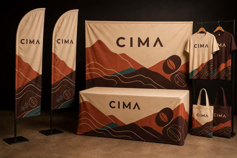 Concepto publicitario CIMA aplicado a banderas, fondo textil, mantel, camisetas y bolsas